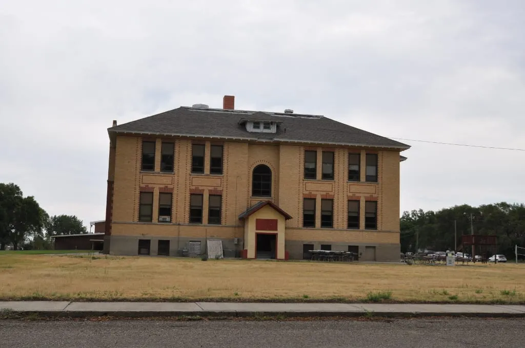Grandey Elementary School in Terry, a two-storey yellow brick school building with tall windows